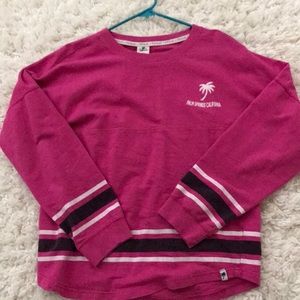 Palm Springs pink long sleeve.